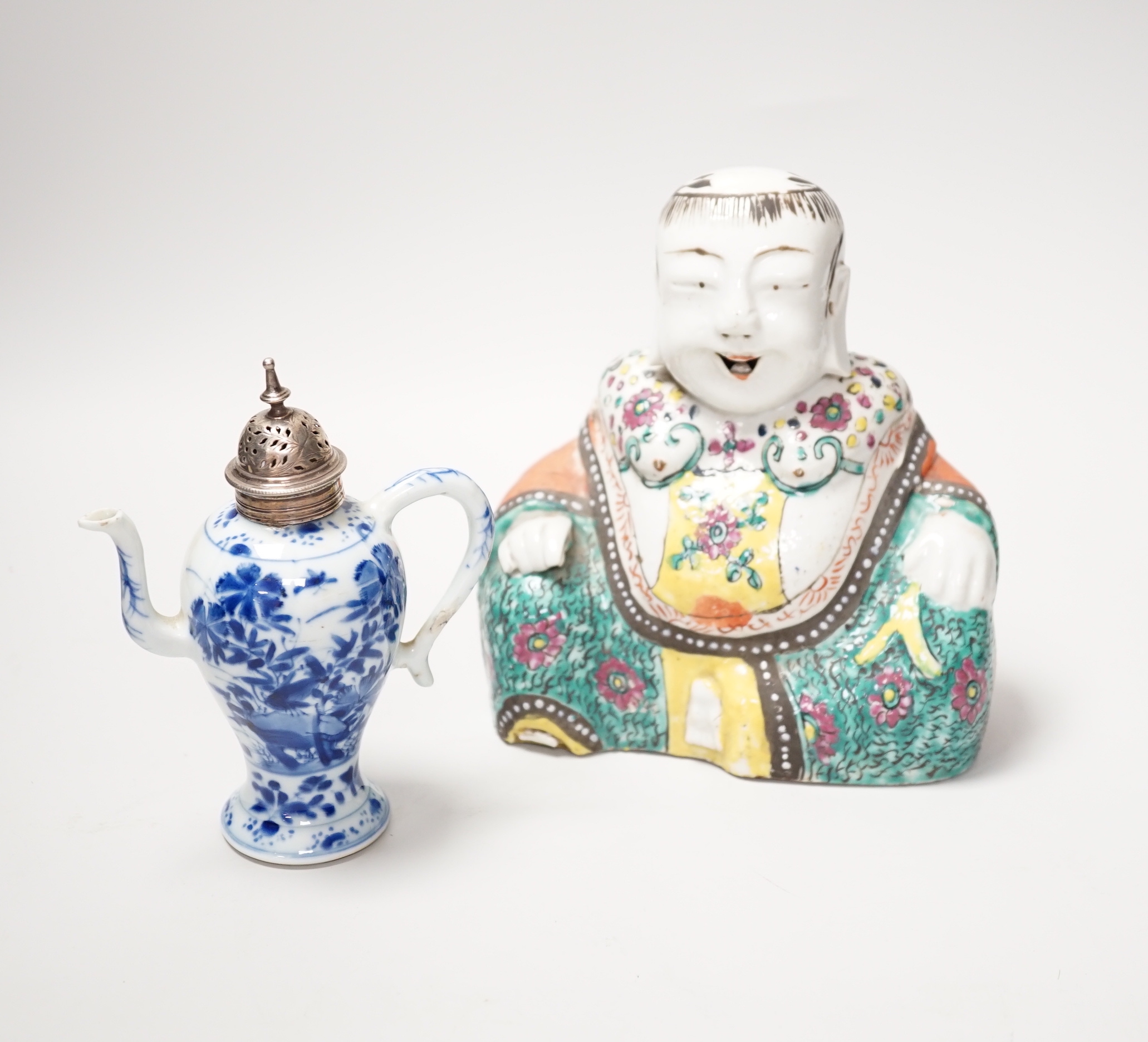 A 19th century Chinese famille enamelled porcelain figure of Budai, 17cm high and a Chinese Kangxi period blue and white small wine ewer and plated cover
